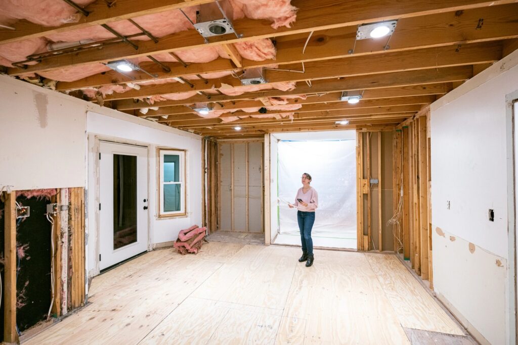 Home owner supervising home renovation progress