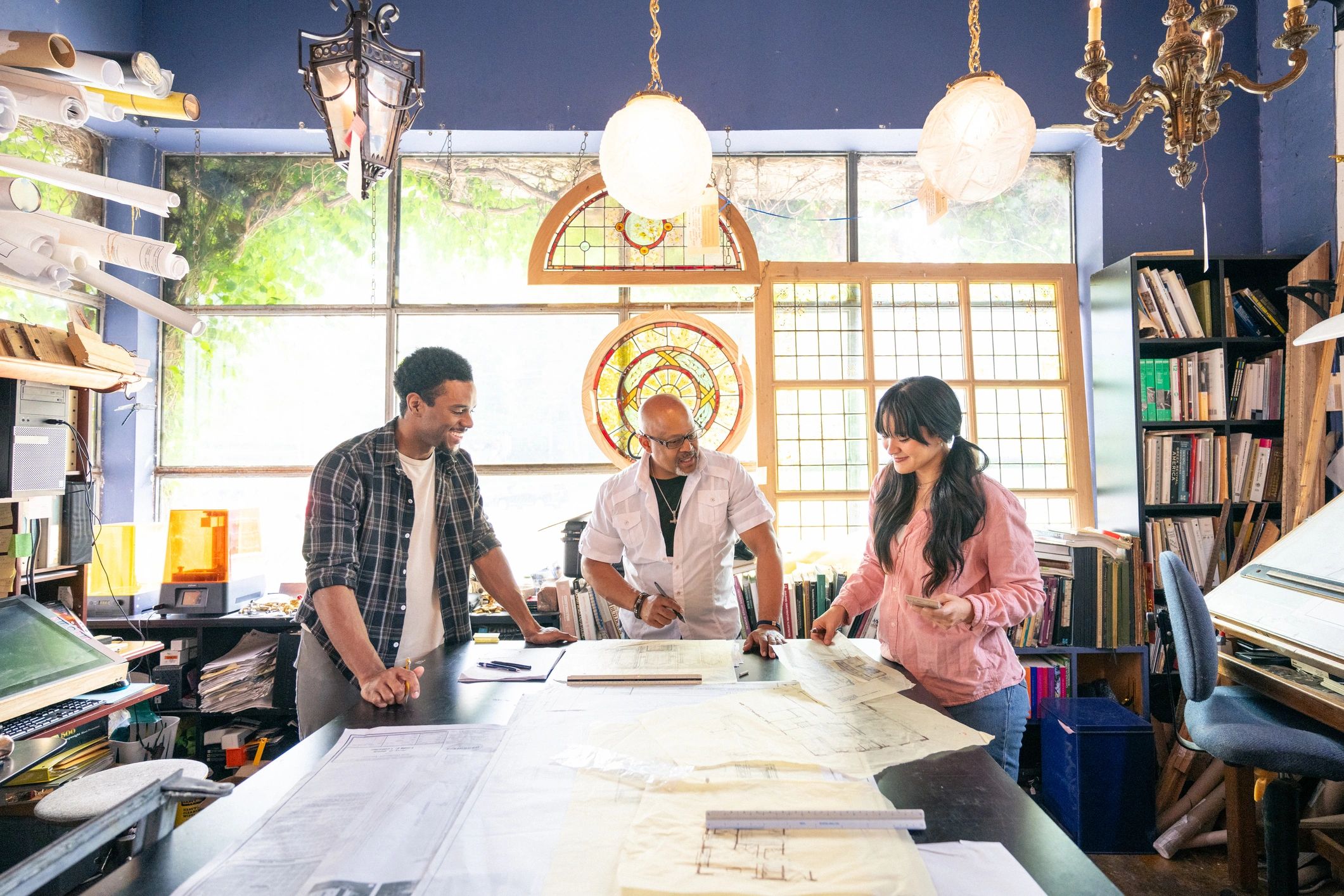 Architects reviewing plans for a residential project